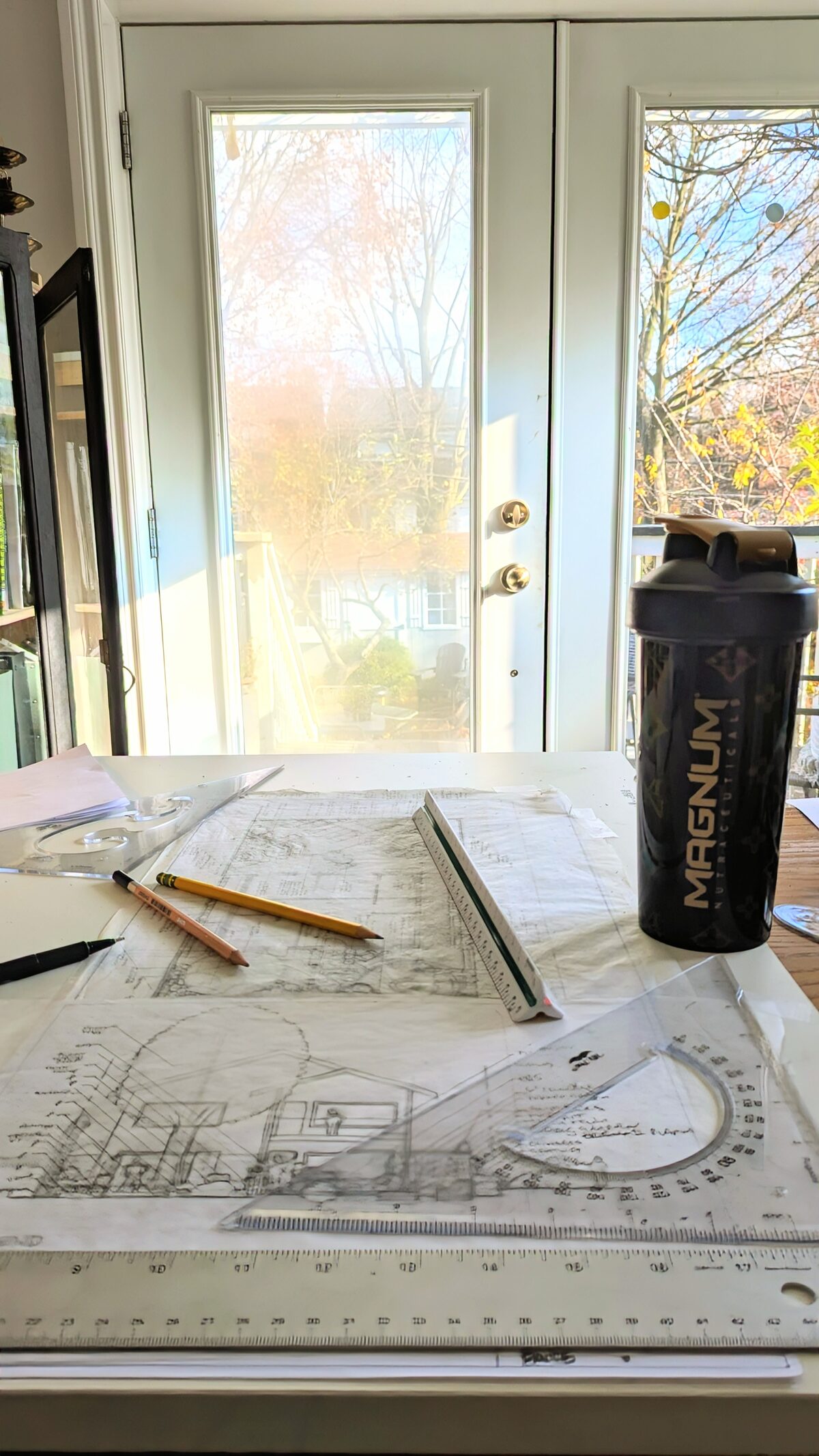 Simone Byrne design drawings at desk
